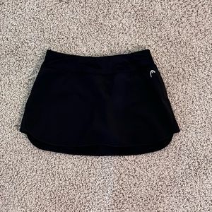 Women’s black head tennis skirt. Size small